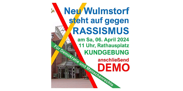 Demoplakat für Demokratie und Menschenrechte, im Hintergrund der Eingang des Neu Wulmstorfer Rathaus